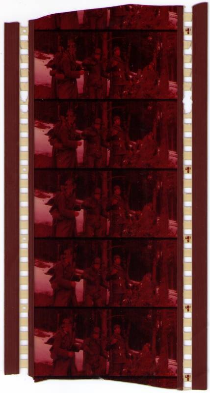 A strip of 70mm film with perforations and image frames